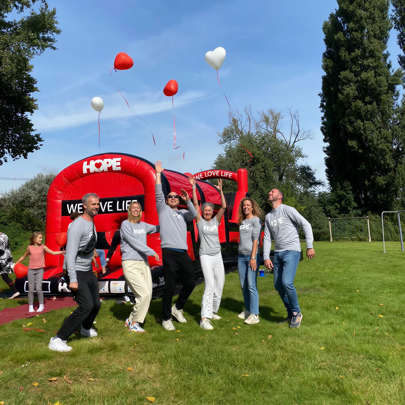 Groepsfoto van de ploeg achter HOPE Benefiet